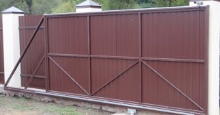 Купить откатные ворота из профнастила Тобольск, цена от 1778 руб.
