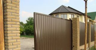 Купить откатные ворота из профнастила Тобольск, цена от 1778 руб.